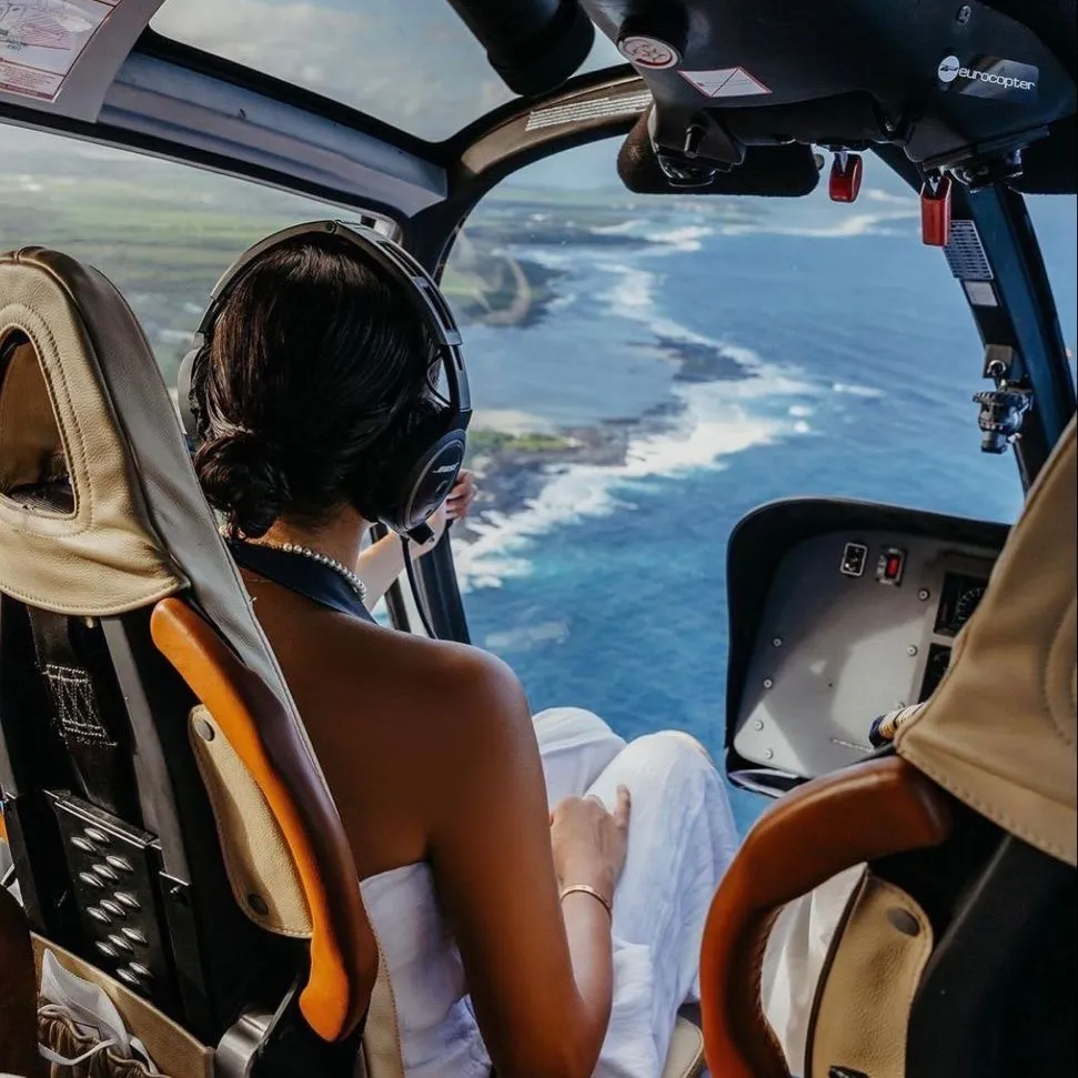 Flying above the ocean by helicopter