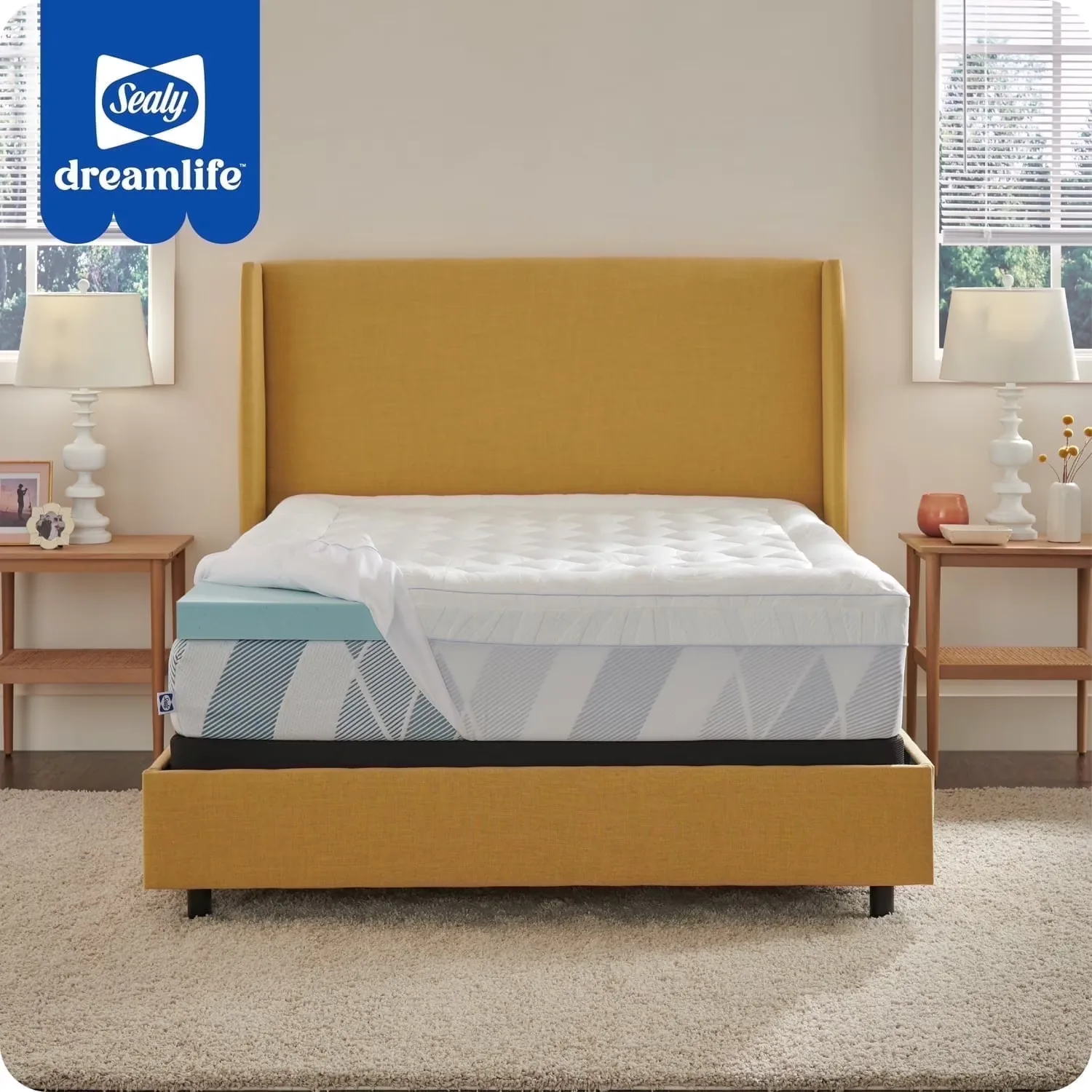 18. Sealy Plush Mattress Topper with Gold-Accent Cover